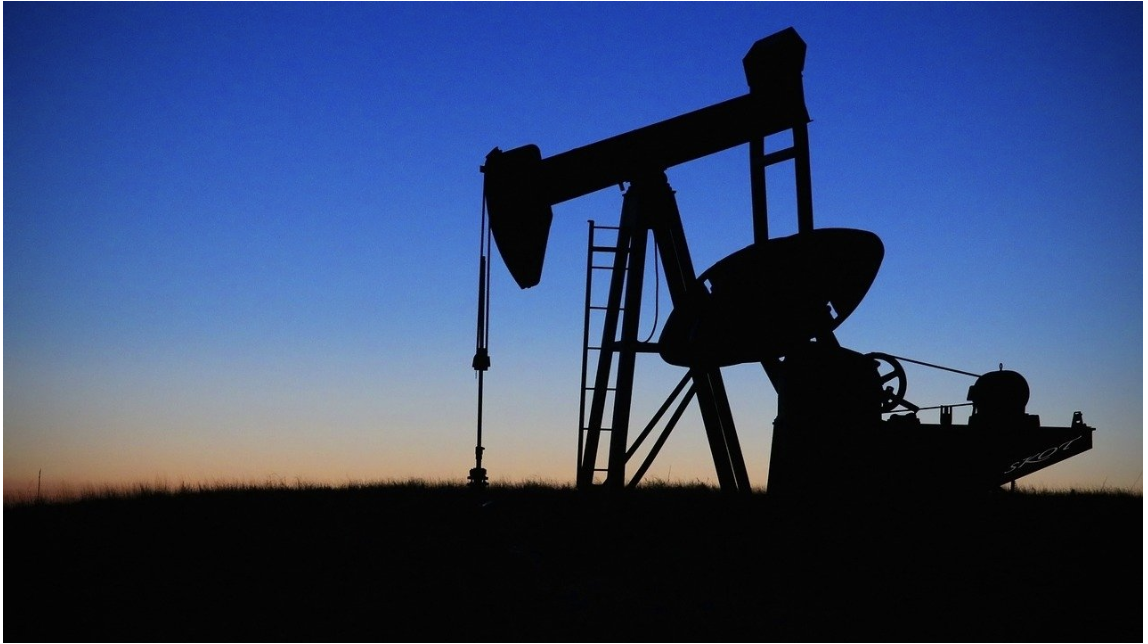 Pump jack at sunset